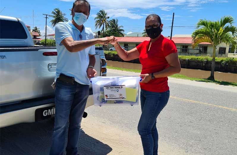 Handing over of safety starter kits to Lake Mainstay Resort as part of the Tourism and Hospitality Association of Guyana (THAG) Safe Travel Guyana initiative (THAG photo)