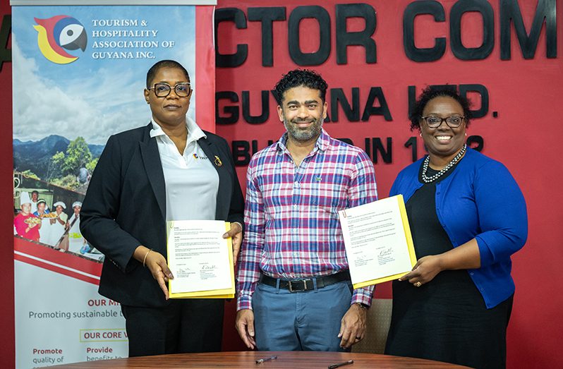 From left: THAG Executive Officer, Oslyn Kirton (left); President of THAG, Harrinand Persaud (centre) and BCSI Executive Director, Michelle Smith-Mayers (Delano Williams photo)