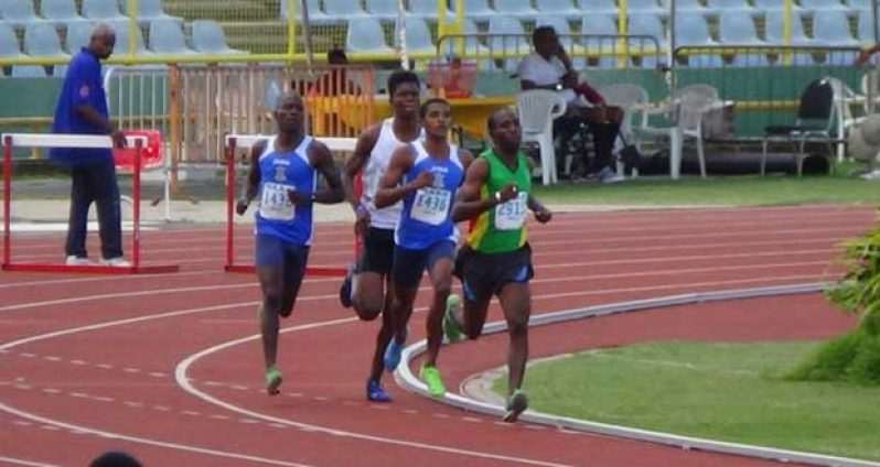 Guyana's Cleveland Thomas leads a pack of runners during the men's 1500m at the Sagicor Open Championships.
