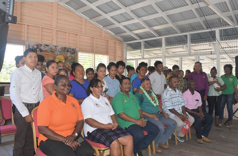 Minister of Indigenous Peoples’ Affairs, Sydney Allicock (fourth seated) with participants of the HEYS programme in Region Three.