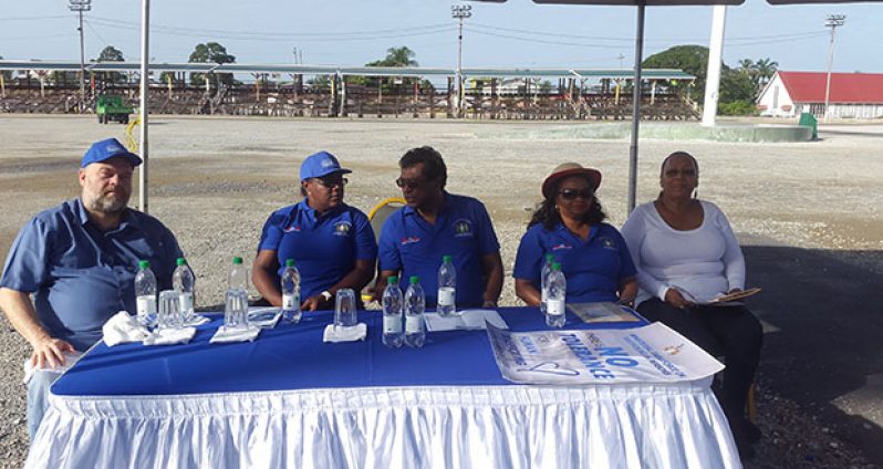Public Security Minister Khemraj Ramjattan in discussion with Minister within the Ministry of Natural Resources, Simona Broomes, in the presence of Minister of Social Protection, Volda Lawrence (right), and US Ambassador Perry Holloway (right) on Saturday