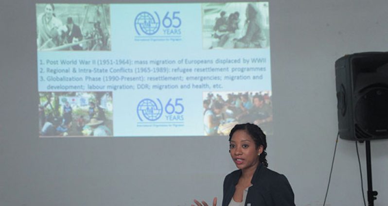One of IOM’s representatives briefing participants on the history of the organisation (Aubrey Odle)