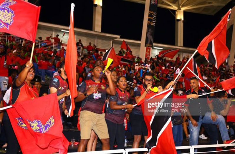 This handout image provided by CPL T20 shows fans of Trinbago Knight Riders during the Hero CPL match between Trinbago Knight Riders and Barbados Tridents at Brian Lara Stadium on October 10, 2019 in Tarouba, Trinidad & Tobago (Photo by Ashley Allen - CPL T20/Getty Images)