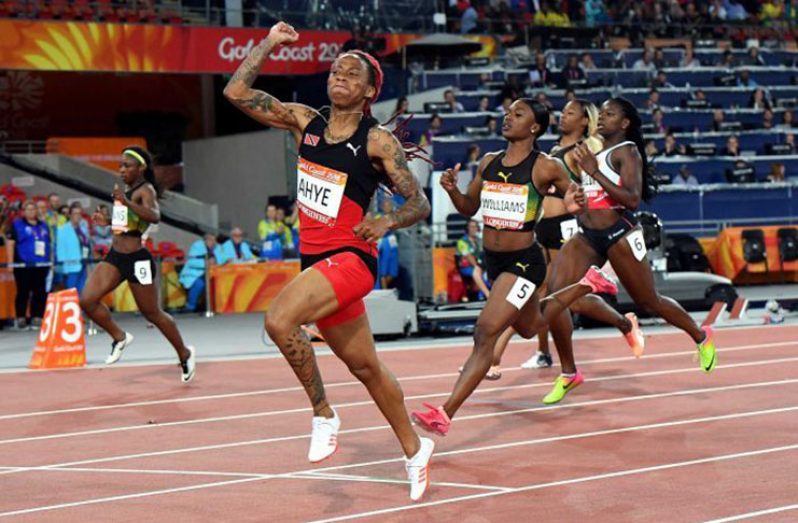 Michelle-Lee Ahye of Trinidad and Tobago wins the women's 100m at the Commonwealth Games. Ahye gave Trinidad and Tobago its first gold medal in the women's blue-ribbon event, clocking 11.14 secs.
