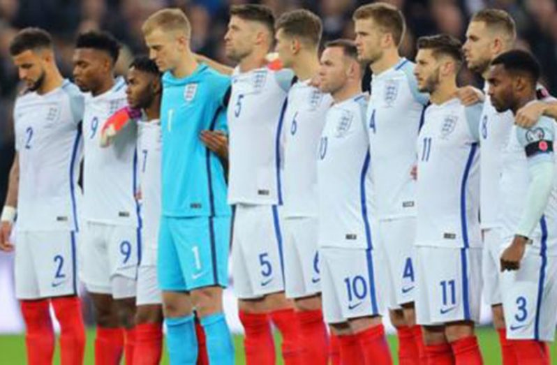 England and Scotland players wore armbands bearing poppies during their World Cup qualifier on Armistice Day.
