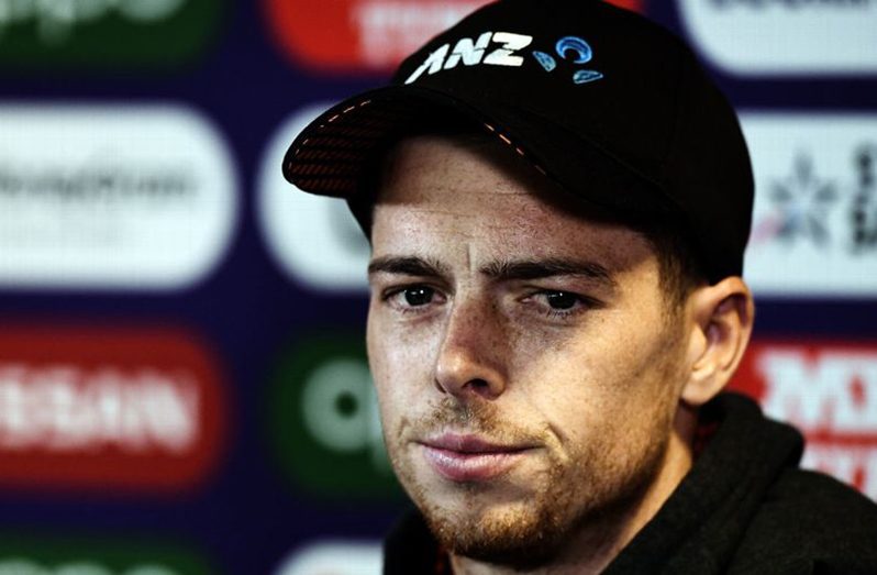 Mitchell Santner talks to the press. (Paul Ellis/AFP/Getty Images)