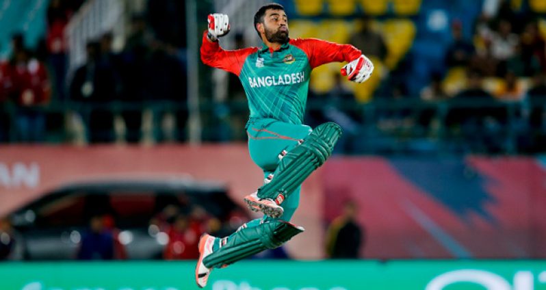 Tamim Iqbal is pumped up after reaching his maiden T20 international century against Oman in Dharamsala, yesterday.