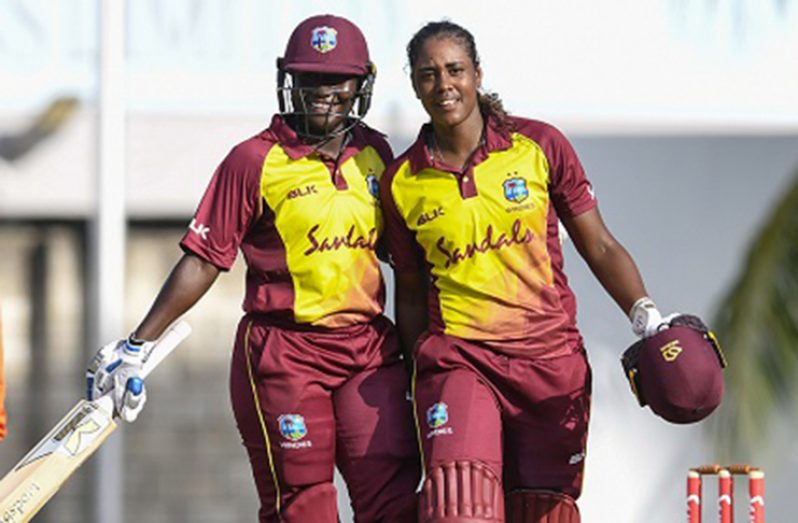 Captain Stafanie Taylor (left) celebrates with Hayley Matthews after the opener reached her maiden international hundred. (Photo courtesy CWI Media)