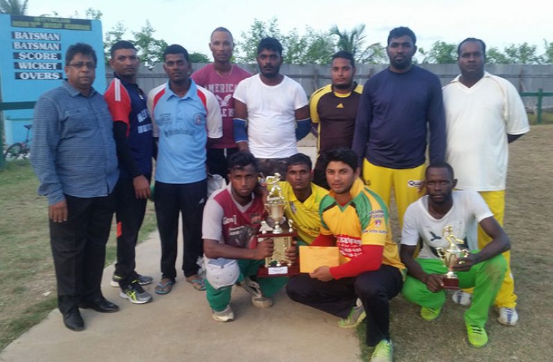 The winning Sham Grocery XI team pose with their silverware and Bakewell CEO Rajin Ganga.