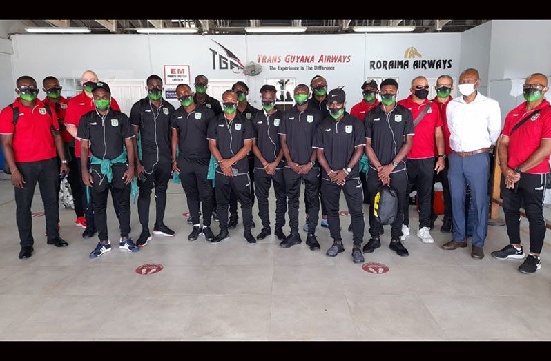 Golden Jaguars football team prior to departure from the Eugene F. Correia International Airport yesterday