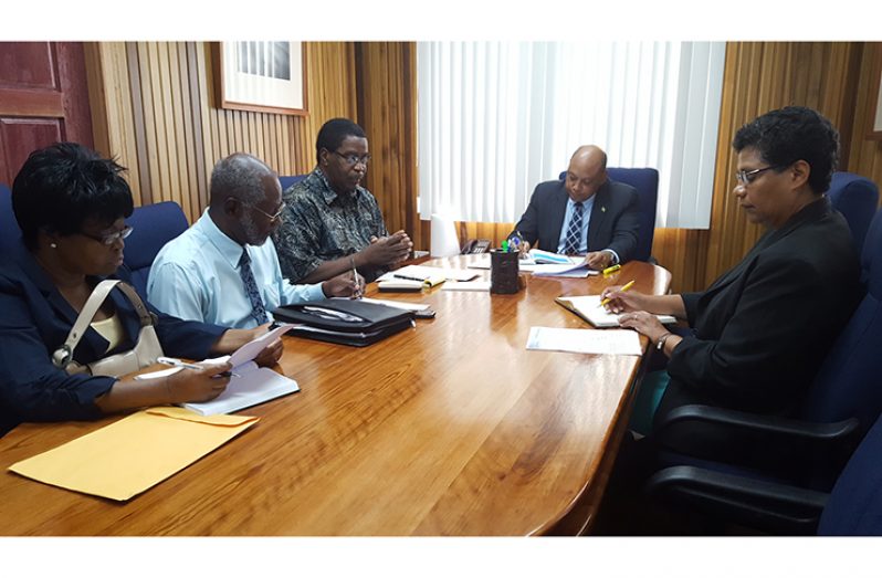 From left are Karen Livan, William Woolford, Sherwood Lowe, Minister Trotman and Technical Officer for Mining in the MNR, Euliene Watson