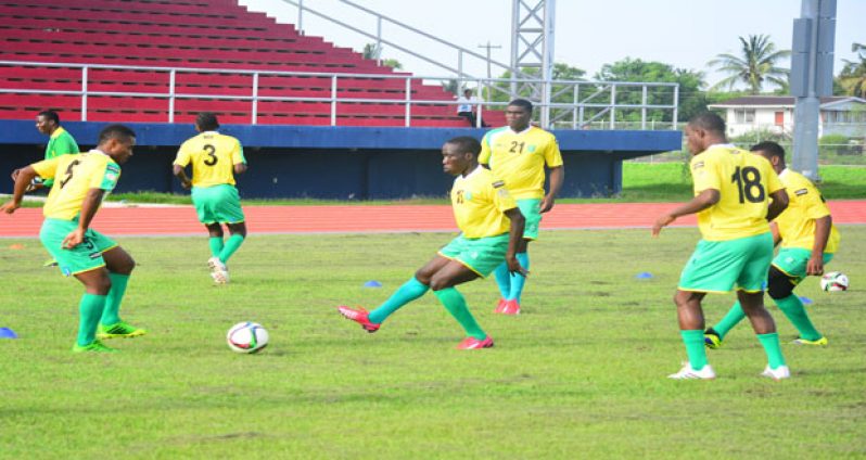 Members of the Golden Jaguars in training at the National Track and Field and Football facility yesterday. (Samuel Maughn photo)