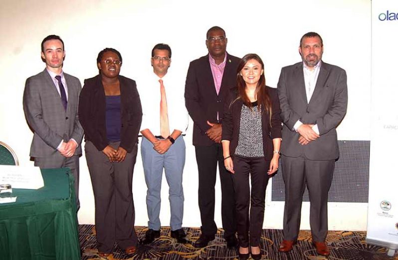 From Left to Right: Gabriel Castellanos-Senior Energy Specialist OLADE, Ms. Shevon Wood-Head Energy & Energy Statistics Department -GEA, Dr. Mahender Sharma CEO –GEA, Minister Patterson – Minister of Public Infrastructure, Ms. Valeria Balseca, Project manager-OLADE and Andres Schuschny, Director of Project – OLADE.