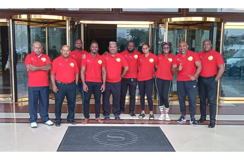 The 2023 GAPLF Team to the 10th Annual FESUPO Regional Powerlifting Championships pose outside their hotel in Lima, Peru, after arriving, yesterday.