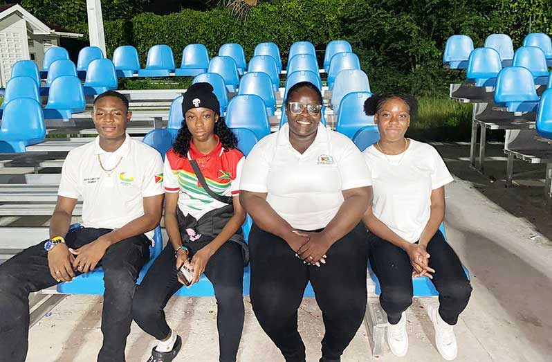 From (left to right) - Malachi Austin, 400m, Tiana Springer 400m Coach /Manager- Kenisha Headley and Athalya Hinckson 100 and 200 meters