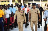 Commissioner of Police, Clifton Hicken and Deputy Commissioner Ravindradat Budhram along with the ELT at the Police Officers' Mess Annexe, Eve Leary