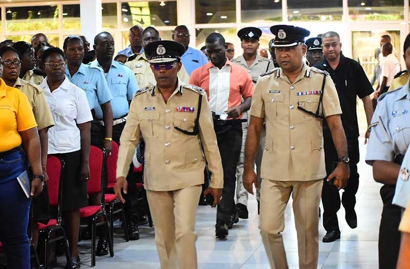 Commissioner of Police, Clifton Hicken and Deputy Commissioner Ravindradat Budhram along with the ELT at the Police Officers' Mess Annexe, Eve Leary