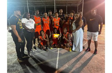Champions Victory Valley Royals celebrate after winning the LABA Nigel Hinds League in Linden