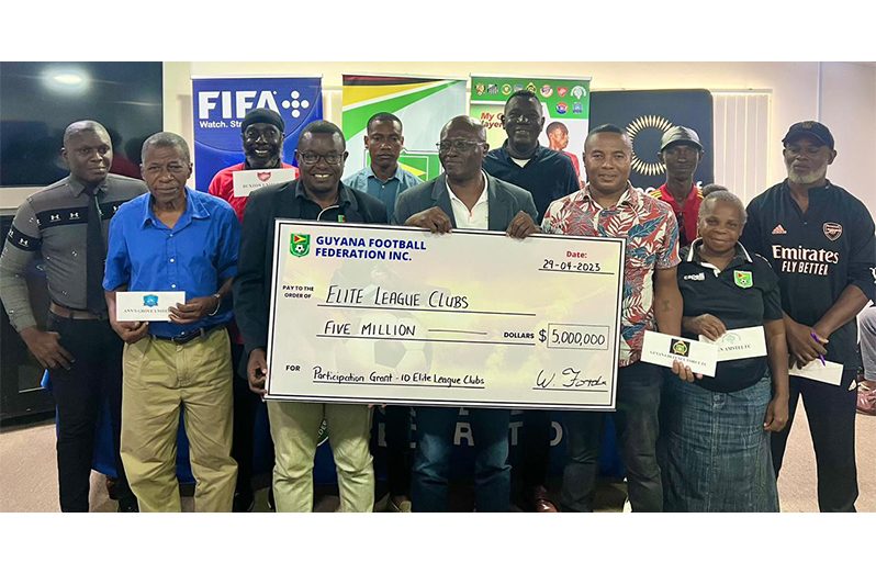 GFF’s Technical Director Brian Joseph and General Secretary Ian Ales hands over participation grants to the ten elite teams.