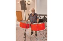 Terrence Benjamin doing what he loves best, playing steelpan