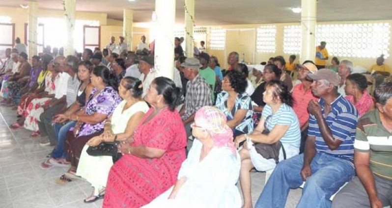 The elderly listen to a lecture on health