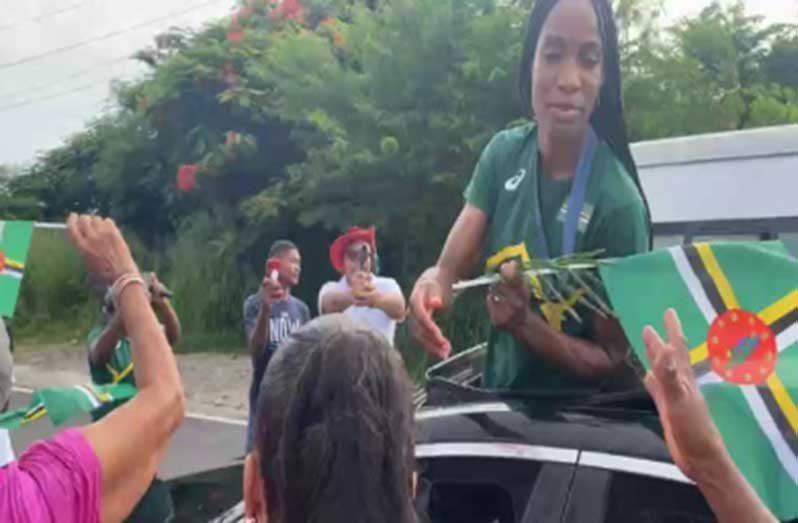 Dominica’s first Olympic gold medalist Thea LaFond being greeted during her motorcade on Sunday