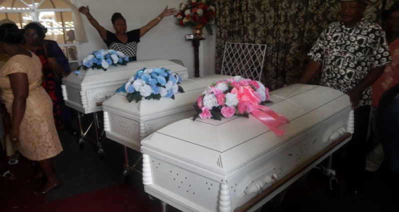 The three caskets in which the children were buried