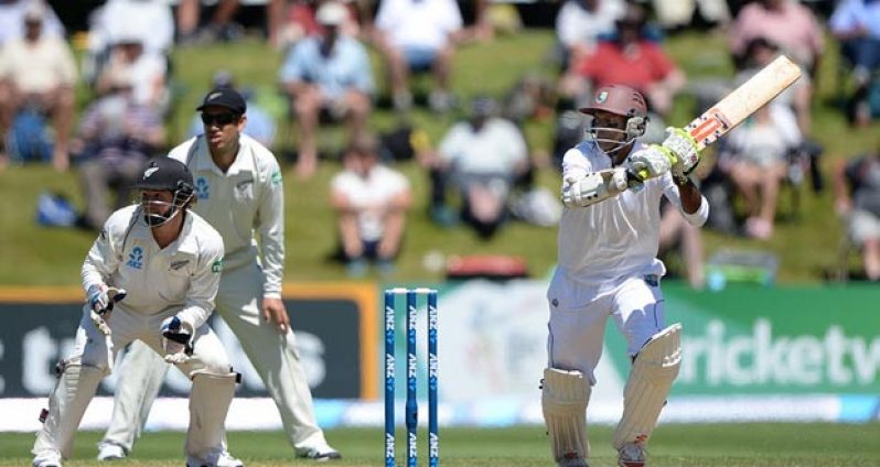 Dependable West Indies left-handed batsman Shivnarine Chanderpaul is watched by New Zealand’s wicketkeeper Bruce Watling and skipper Ross Taylor, as he gathers runs on the leg side during his first innings’ 76. (Photo courtesy flickr.com/windiescricket)