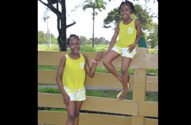 TIMERA & TROSHONNA chose short shorts and and matching tank tops for the warm weather; fashion-conscious kids will always opt for comfort, especially when playing and romping around the backyard.