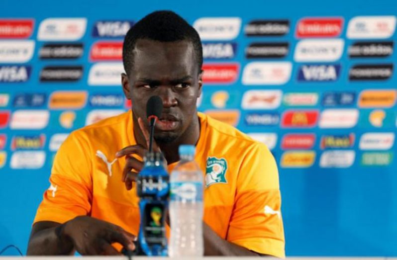 Ivory Coast player Cheick Ismael Tiote answers questions during a news conference at the Mane Garrincha National Stadium in Brasilia, June 18, 2014. (REUTERS/Ueslei Marcelino/File Picture)