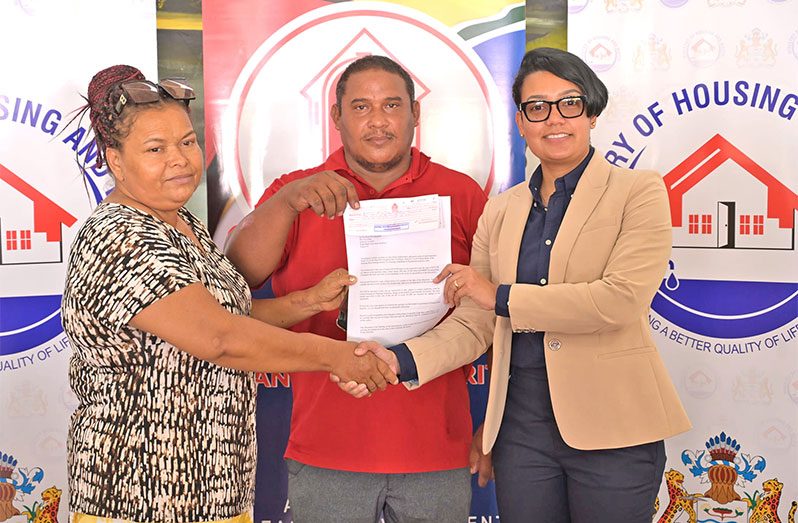 The first 167 families who have been squatting in Amelia’s Ward Phase Four, Linden, Region 10, signed their agreements of sale for the processing of their certificates of title