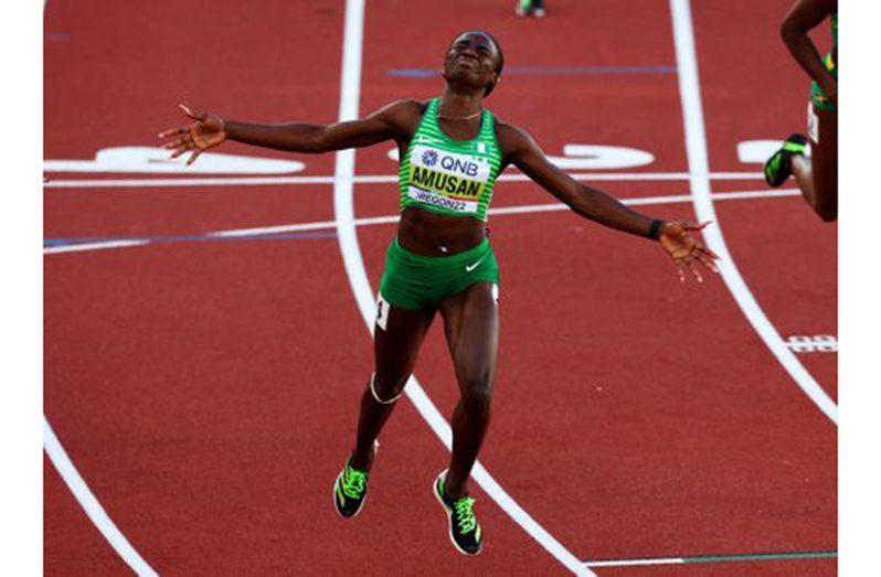 Nigeria’s Tobi Amusan celebrates winning the women's 100 metres hurdles final at Hayward Field, Eugene, Oregon, U.S. - July 24 (REUTERS/Mike Segar)