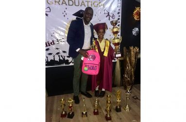 Rawle Toney with the first recipient of the Jarrell Toney Grant, Ashanti Balgobin, who copped a place at The Bishop’s High School