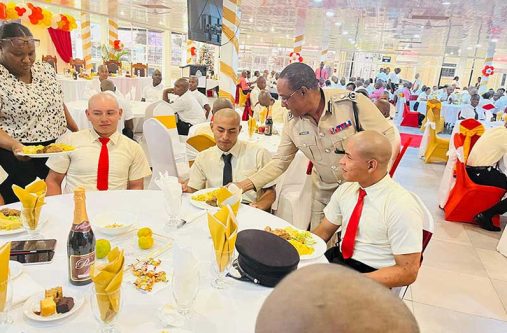 Commissioner of Police (ag) Clifton Hicken serving recruits at the Police Officers’ Mess Annexe, Eve Leary, Georgetown