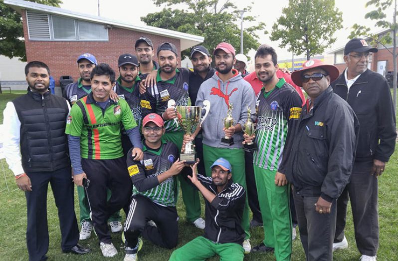 Victorious Elite League champions celebrate their triumph.