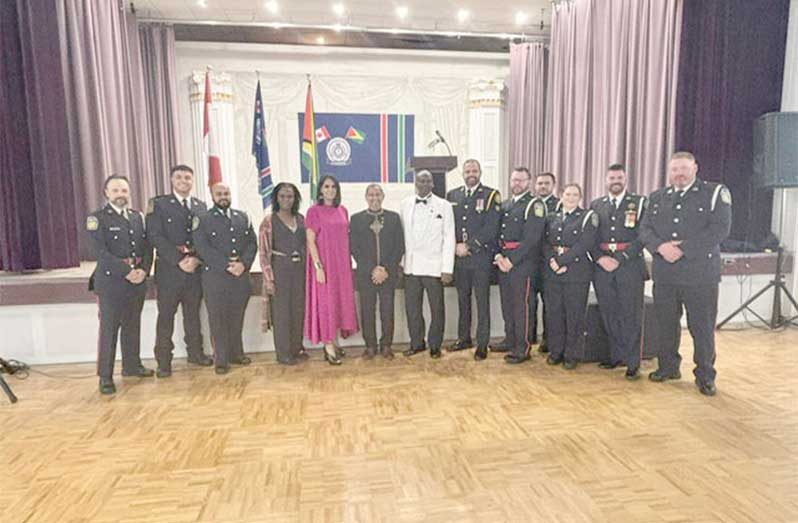 Members of Toronto and Peel Police Services pose with GEPAC President Floyd Blyden and Honorary Consul Mani Singh