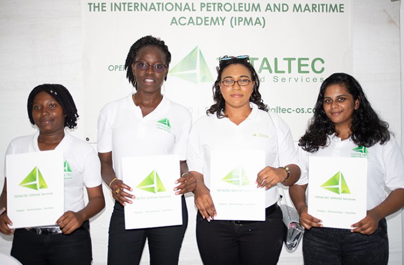 The first four women to graduate from Totaltec, from left, Coleen Moore, Muarisia James, Rubena Adiana, and Kristina Balram
(Delano Williams photo)