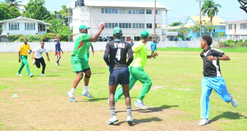 The Demerara team were caught by Chronicle Sport photographer Adrian Narine playing a game of touch rugby, ahead of their practice session in sweltering heat at the Demerara Cricket Club ground last Tuesday afternoon.