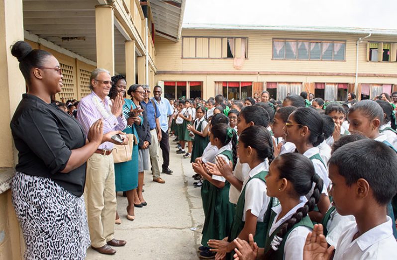 Minister of Education, Dr Rupert Roopnaraine (second left) and Region 4 officials during Monday’s visit with teachers and pupils at Mon Repos Primary