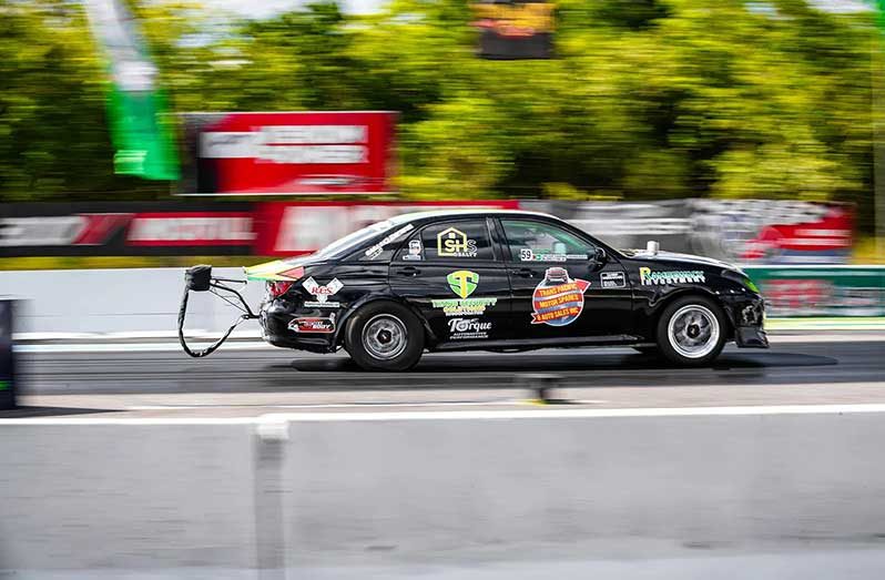 Caption Sahadeo Ramsewack piloted the fastest Toyota Verossa in a sub -Nine second time (Zeus Edwards photos)