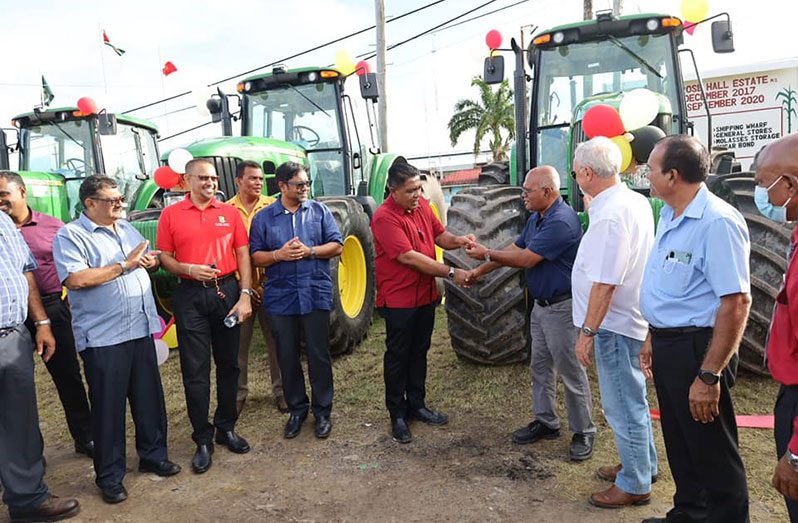 Minister of Agriculture, Zulfikar Mustapha (fifth from left), hands over the keys for the newly commissioned machines