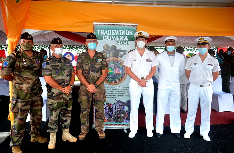 Participants from multinational militaries pose for a photo at a simple ceremony to officially declare ‘Tradewinds Exercise 2021’ open on Sunday at the Guyana Defence Force Base Camp Ayanganna, Georgetown (Elvin Croker photo)