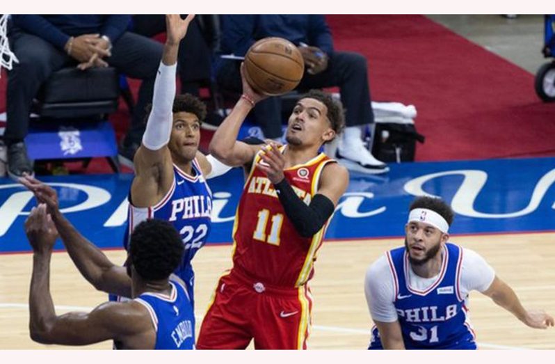 Trae Young's (centre right) 39-point tally was the most he has scored in a play-off tie.