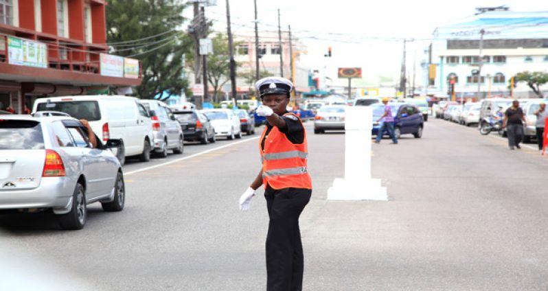 An officer of the M&CC Traffic Management Unit on duty yesterday on Regent Street