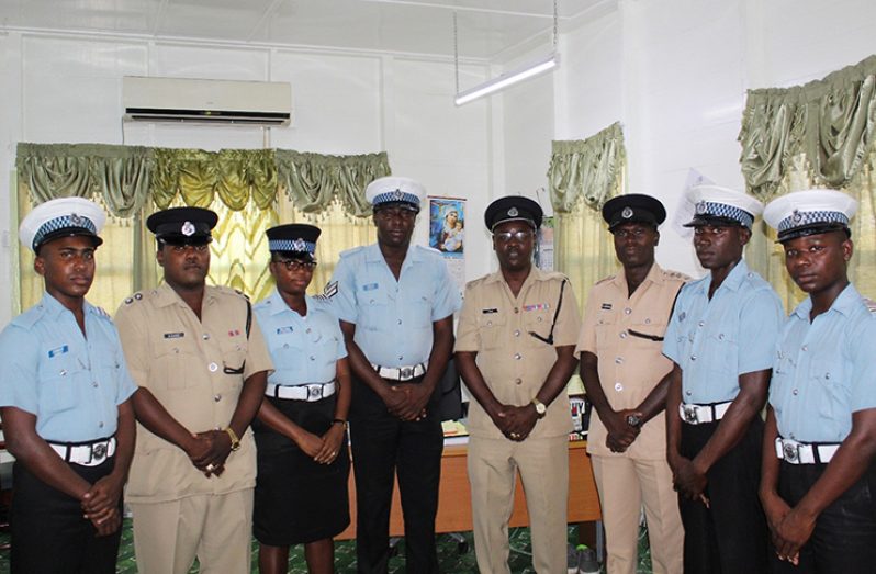 Standing fourth from the right is Traffic Chief, Superintendent Linden Isles, third from the right Deputy Superintendent Dennis Stephen, second from the left Inspector Raun Clarke, Corporal Kenny Bishop and other ranks from the department.