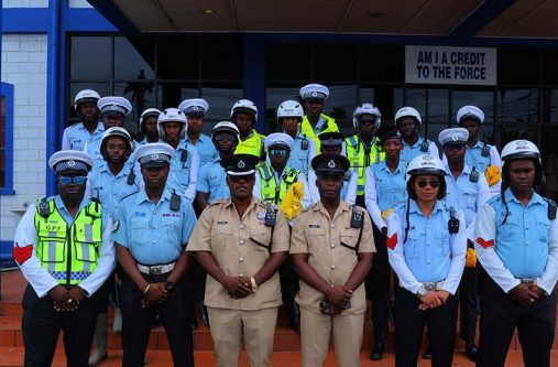 Superintendent Raun Clarke and Assistant Superintendent, Garvin Boyce (centre), flanked by ranks who participated in the training in use of body cameras for digital, audio, and video-evidence collection