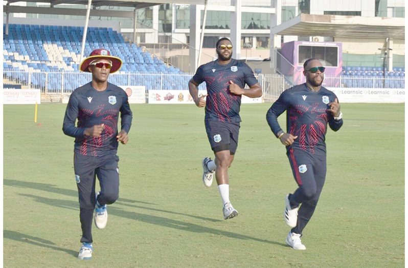West Indies captain Akeal Hosein (left) leads players during a training session on Friday (Photo courtesy CWI Media)