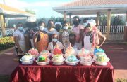 Participants of a baking (cake decorating) class showcasing what they had learnt
