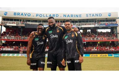 From left: Dwayne Bravo, Kieron Pollard and Sunil Narine during the renaming of a stand in their honour at the Queen’s Park Oval