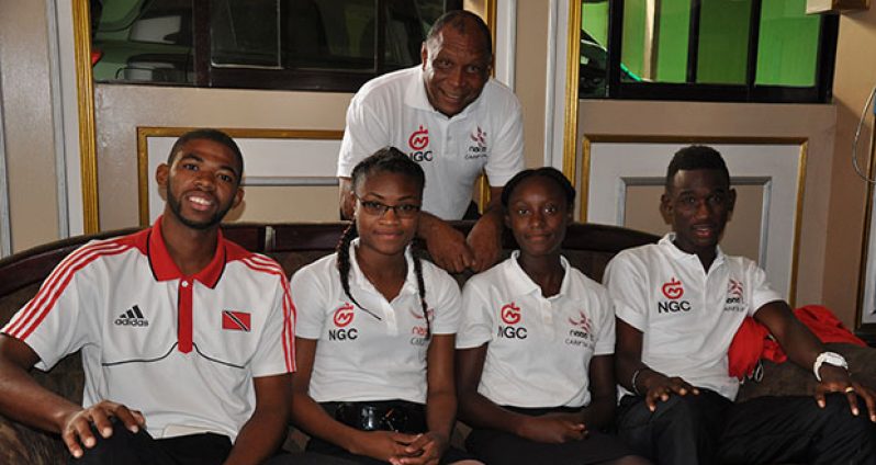 Seated from left: Trinidad’s Ashton Gill, Shikyla Walcott, Joanna Rogers, and Recardo Prescott with manager Kelvin Nancoo in background, shortly after arriving in Guyana to compete in this weekend’s Boyce/Jefford Classic VII.